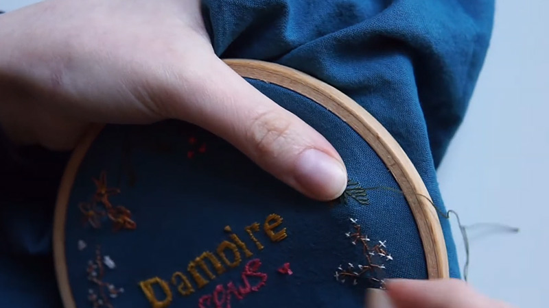 How do you finish embroidery on clothes?