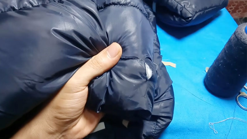 How do you fix a rip in a polyester jacket
