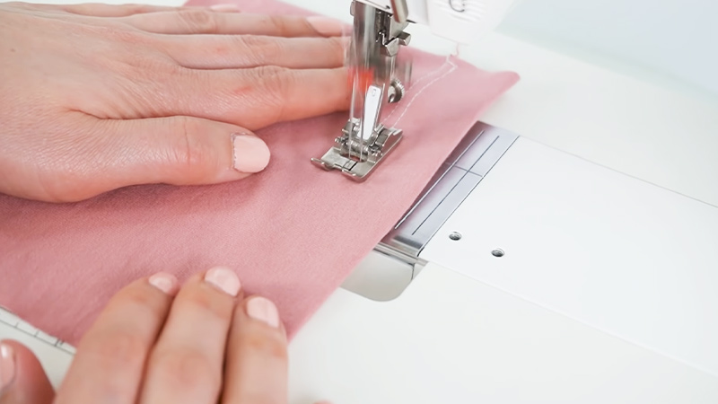Sewing Machine Is Used To Hem Knits