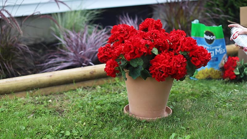 Fill-an-Outdoor-Planter-With-Artificial-Flowers