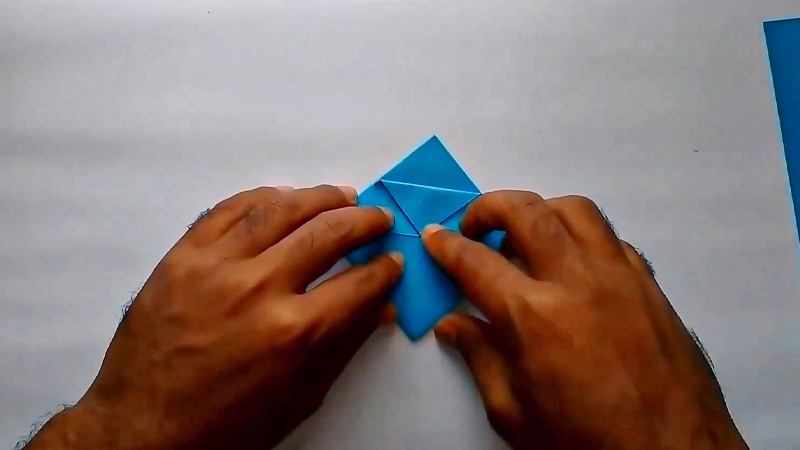 Fold the top and bottom corners