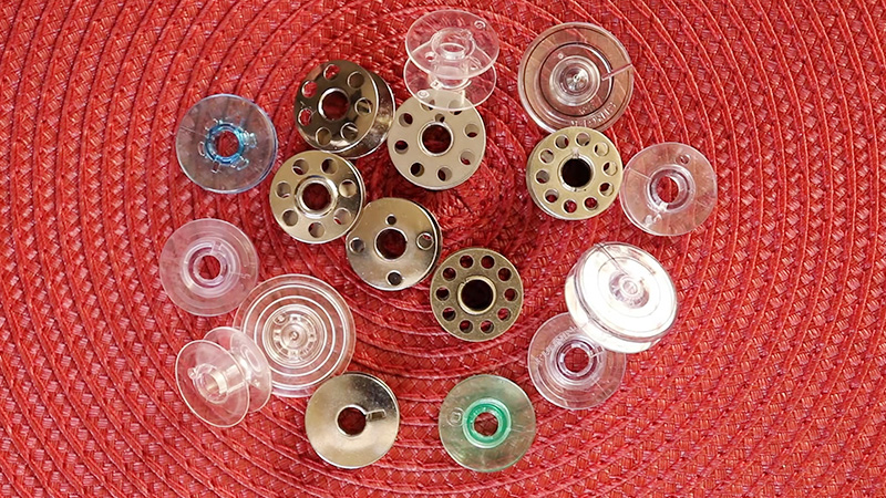 Metal Bobbins vs. Plastic Bobbins