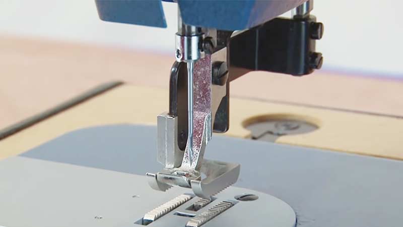 How Do You Properly Install and Adjust the Needle Holder on a Sewing Machine